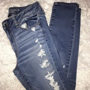 Blue distressed American eagle jeans.